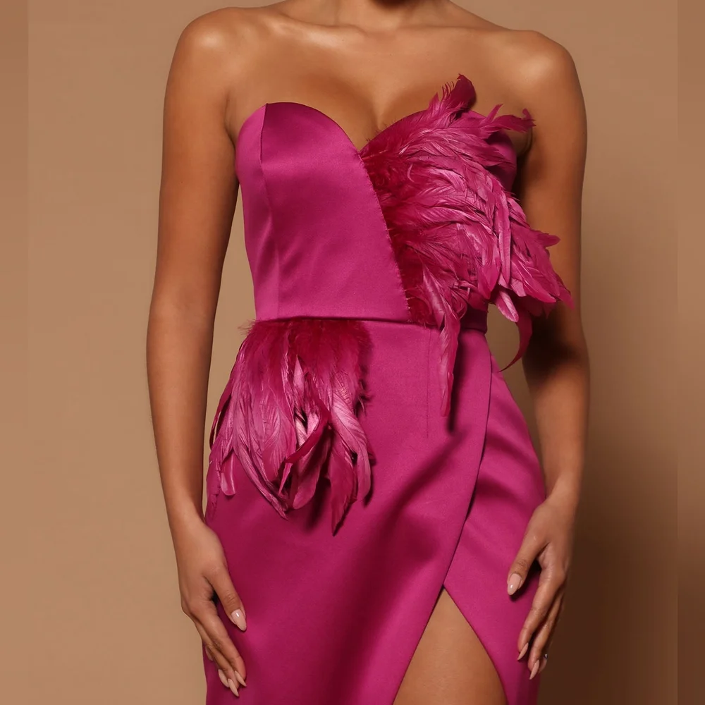 Maxi Asymmetrical dress with feather embellishments - Picture 2 of 7